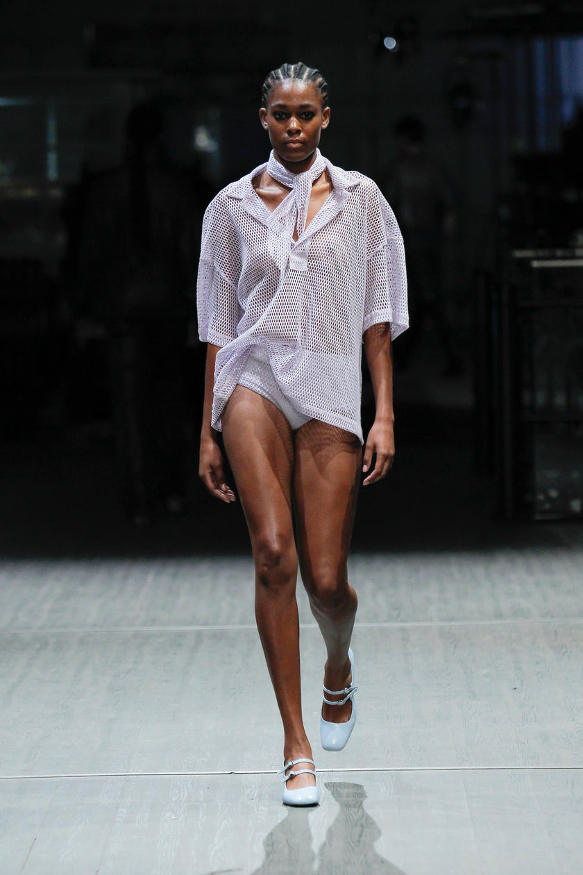 Polo de malha com folha transparente