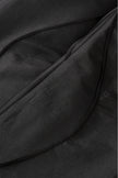 Close-up of black fabric with folds