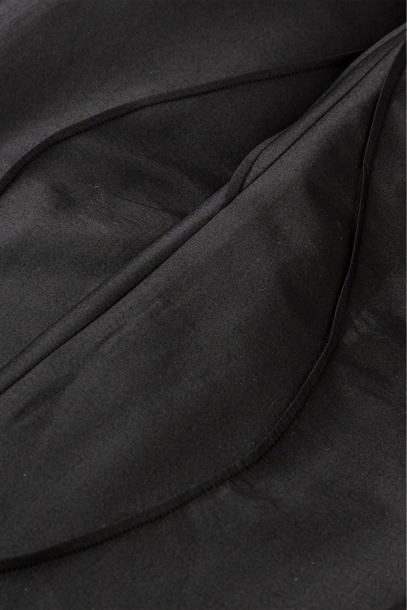 Close-up of black fabric with folds