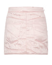 Pink quilted skirt on a white background
