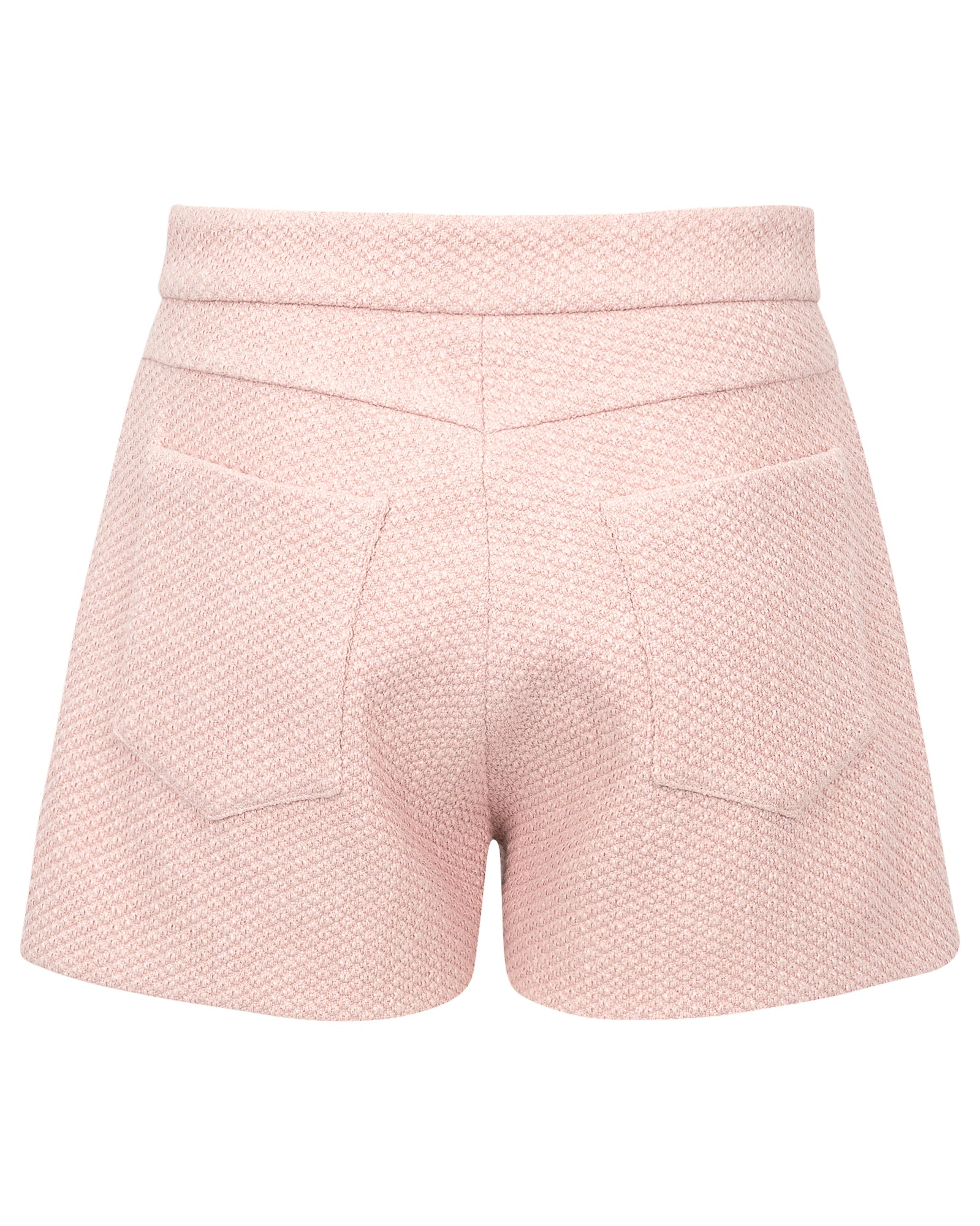 Pink textured shorts on a white background
