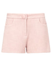 Pink textured shorts on a white background