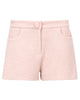 Pink textured shorts on a white background