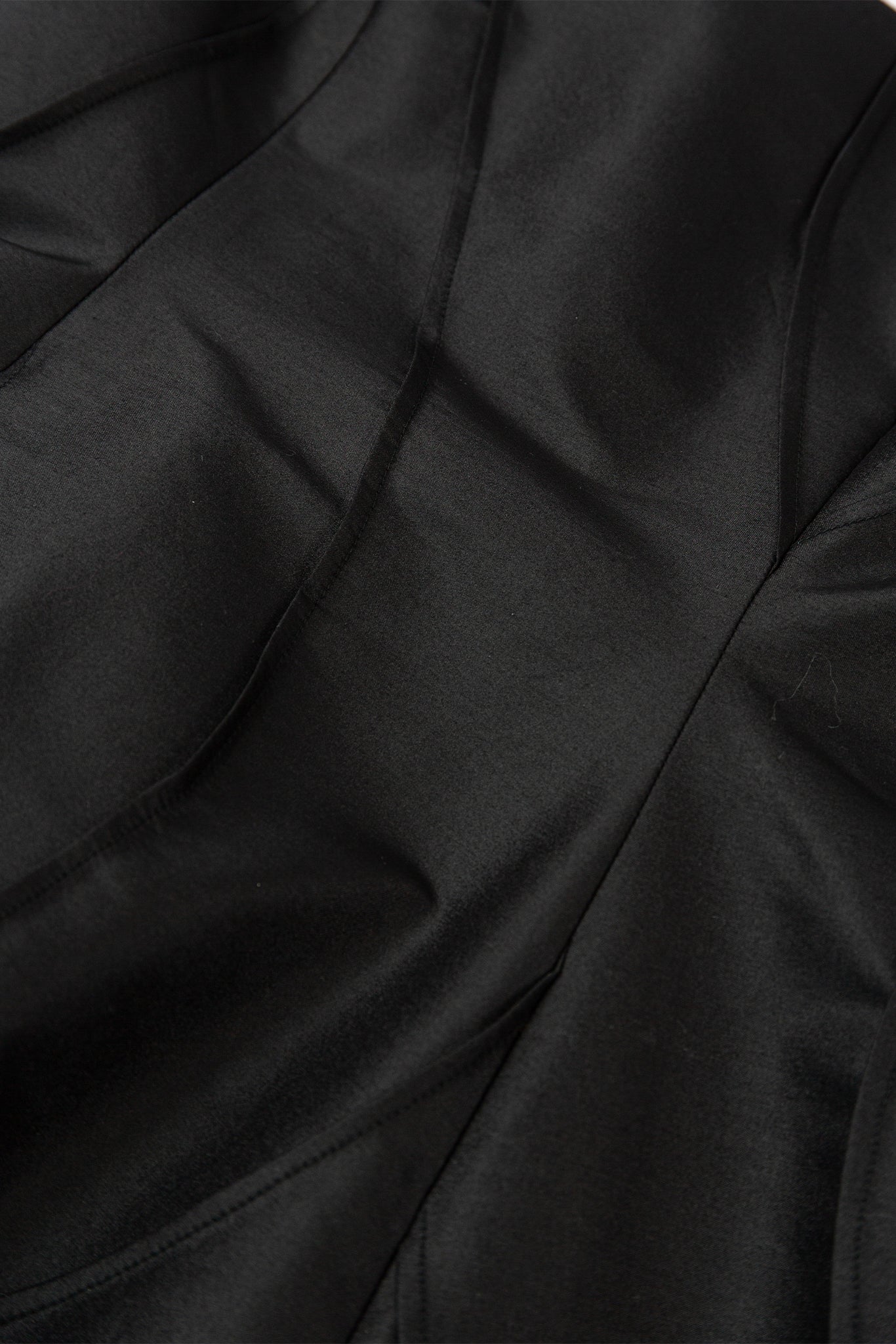 Close-up of black fabric with folds