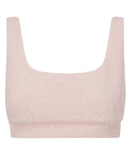 Light pink textured crop top on a white background