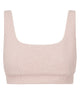 Light pink textured crop top on a white background