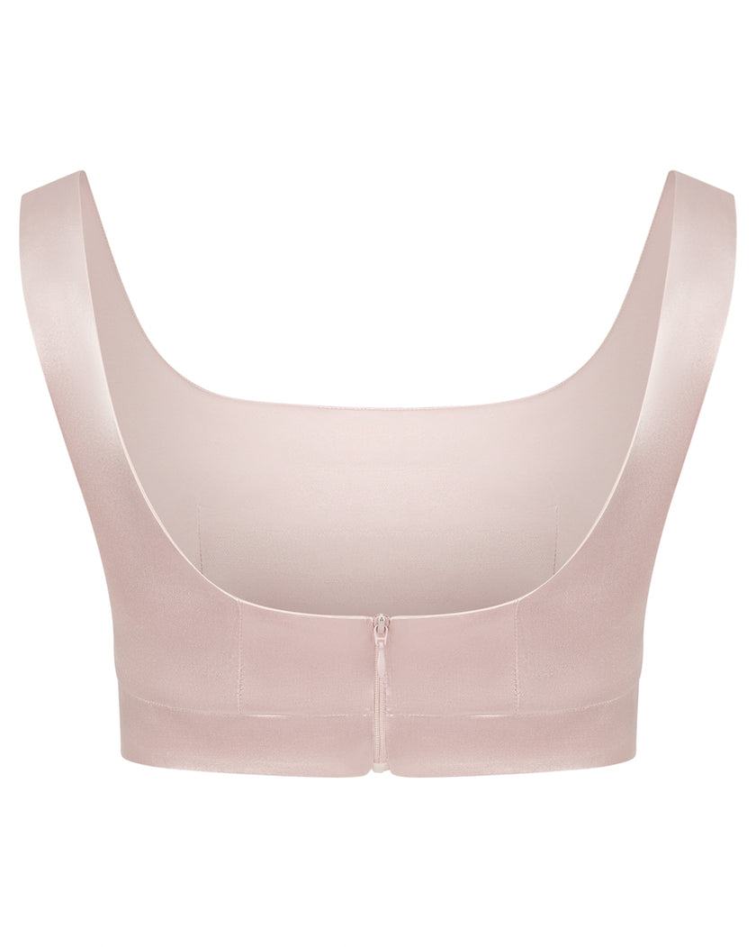 Pink bralette on a white background