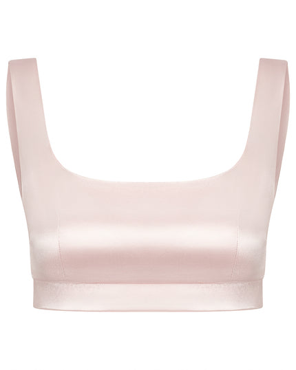 Light pink bralette on a white background