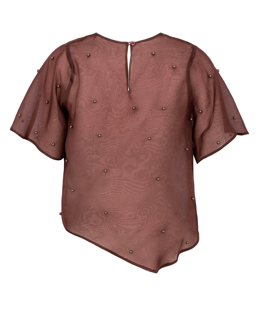 Brown blouse with decorative buttons on a white background