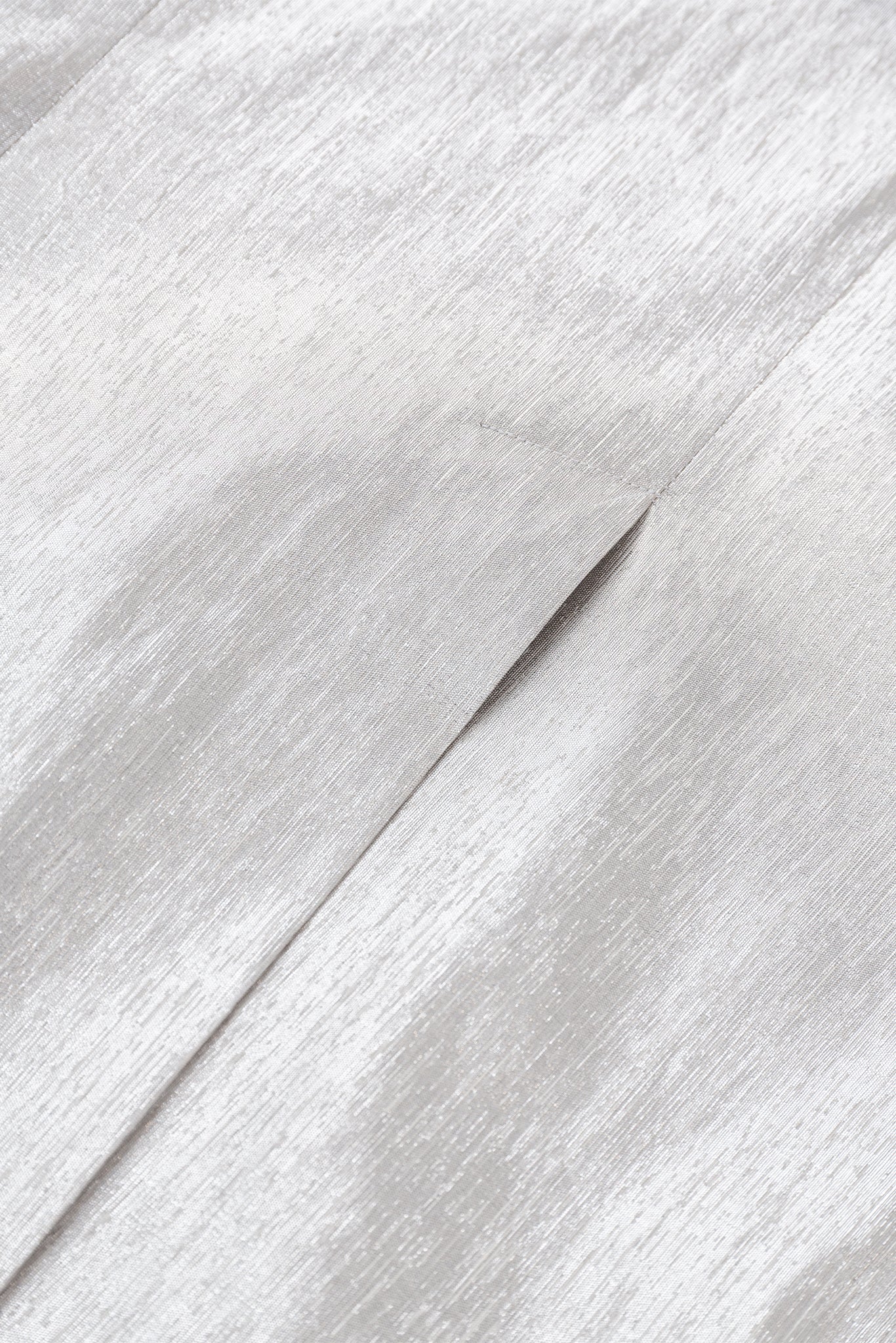 Close-up of gray fabric with a subtle pattern