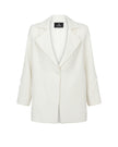 White blazer with a brand label on a white background