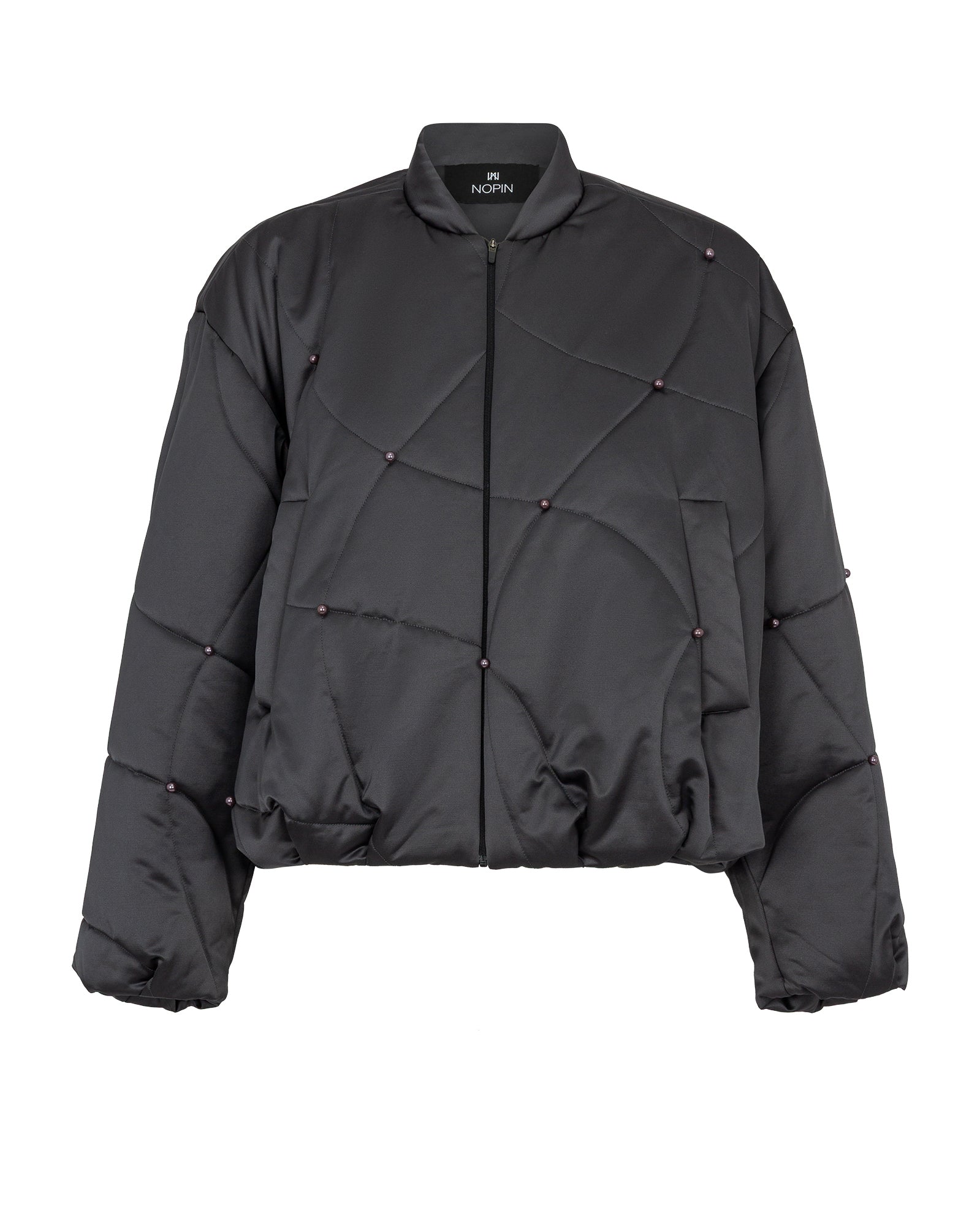 Black quilted jacket with geometric design on a white background