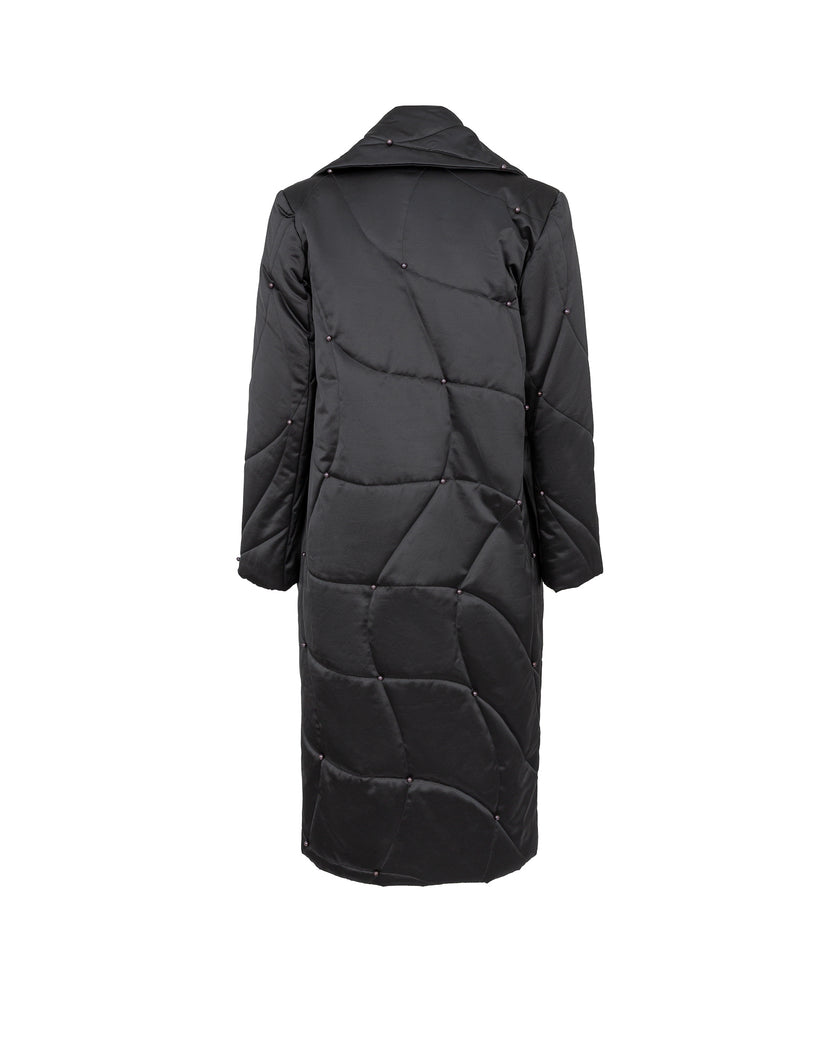Black quilted coat on a white background