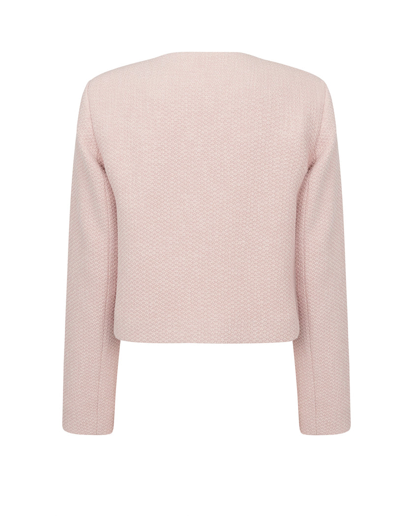 Pink sweater on a white background