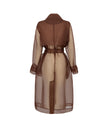 Brown dress with sheer overlay on a white background