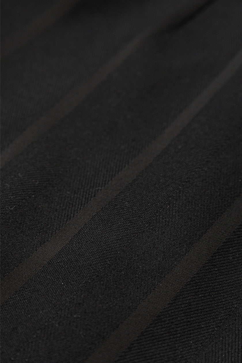 Close-up of black fabric with visible texture