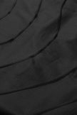 Close-up of black fabric with folds