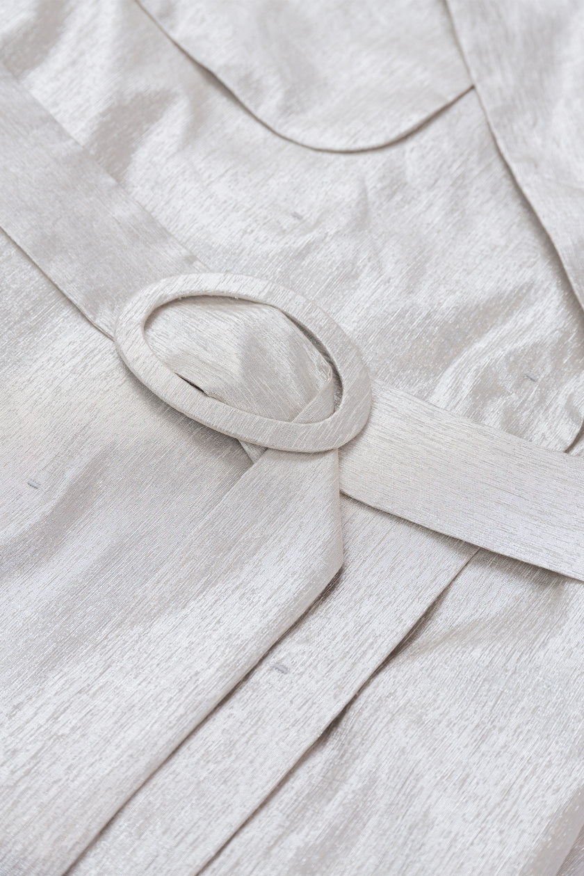 Close-up of a light gray fabric with a belt
